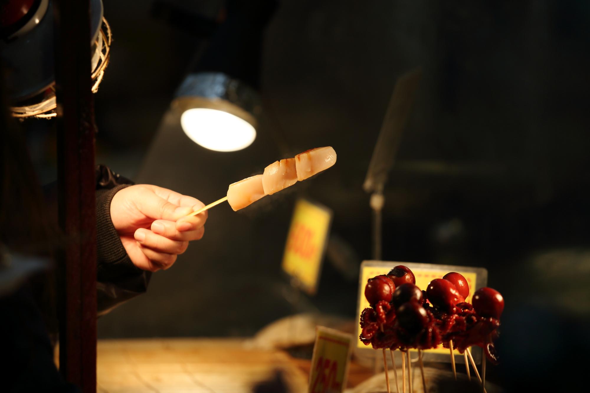 Exterior of culinary studio with warm lighting